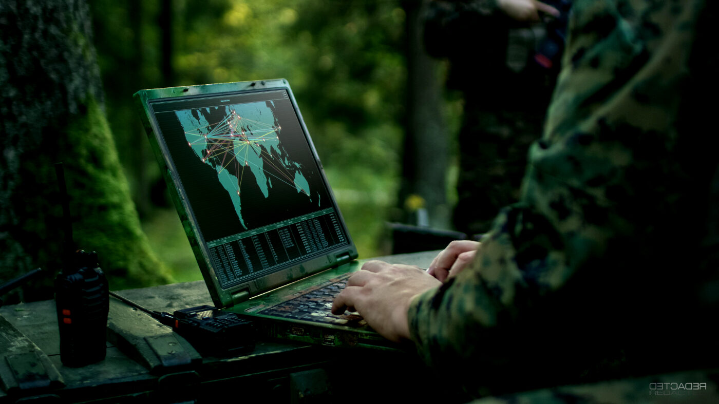 Special Forces Operator on a Laptop | DETCADER